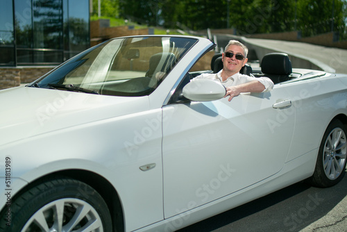 Successful happy man in the convertible. Luxury life © ArtEvent ET