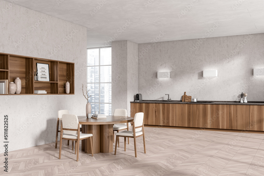 Fototapeta premium Light kitchen interior with table and seats, decoration and kitchenware, window
