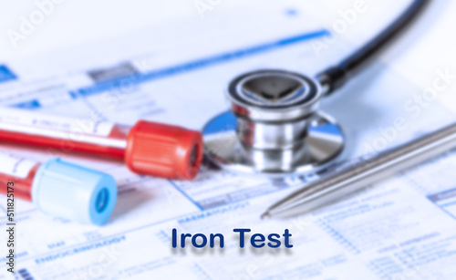 Iron Test Testing Medical Concept. Checkup list medical tests with text and stethoscope