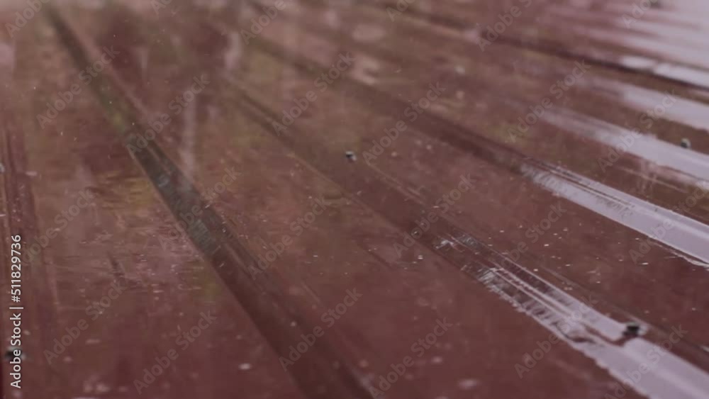 Video of heavy rain drops on the roof
