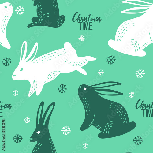 Cute winter pattern with rabbits and snowflakes. Symbol of 2023 