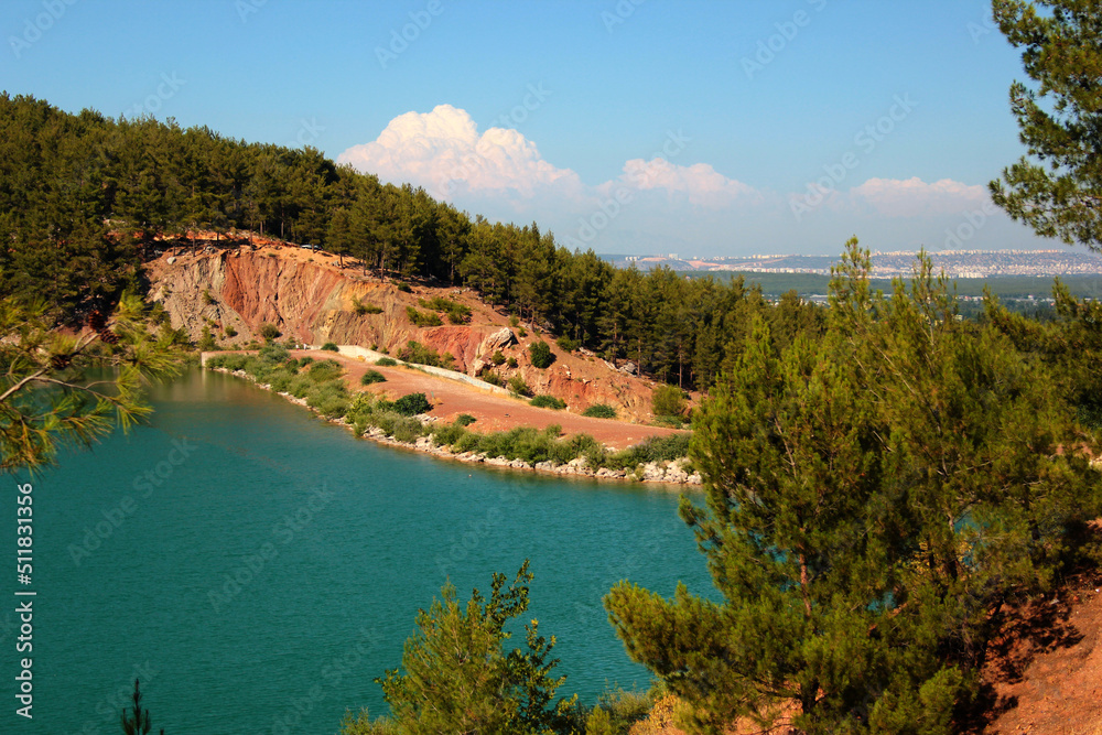 Spectacular Doyran lake in Konyaalti district of Antalya, Turkey. Lake shore is a popular place for outdoor camping and hiking just outside of Antalya.