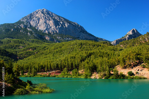 Spectacular Doyran lake in Konyaalti district of Antalya, Turkey. Lake shore is a popular place for outdoor camping and hiking just outside of Antalya.