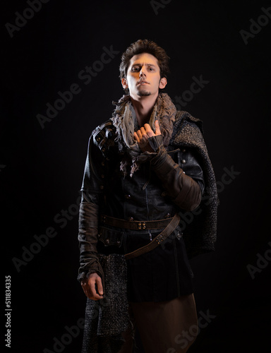 A guy in a steampunk or post-apocalyptic image, portrait on a black background