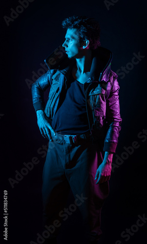 A guy in a cyberpunk image, A young man in neon lighting on a black background