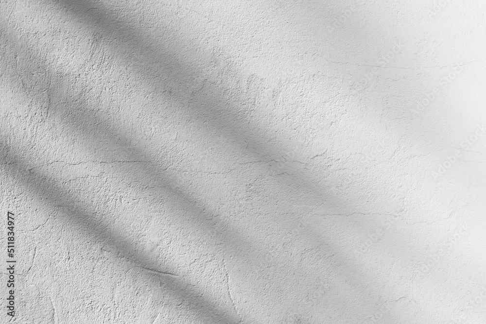 Tree shadow neutral concept background for design presentation. Leaves pattern on white dirty grunge cement texture wall. Abstract nature composition created by sunlight and shadows. Tree shadow neutral concept background for design presentation. Leaves pattern on white dirty grunge cement texture wall. Abstract nature composition created by sunlight and shadows.