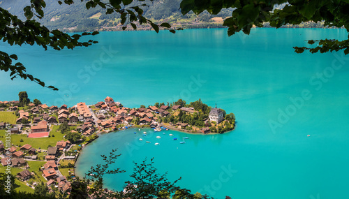 High view over the village of Inseltwald at the turquoise Brienz Lake in Switzerland. photo
