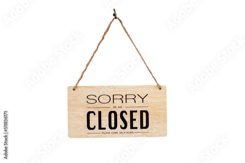 Sorry we're closed sign. wooden image hanging isolated on white background,With clipping path