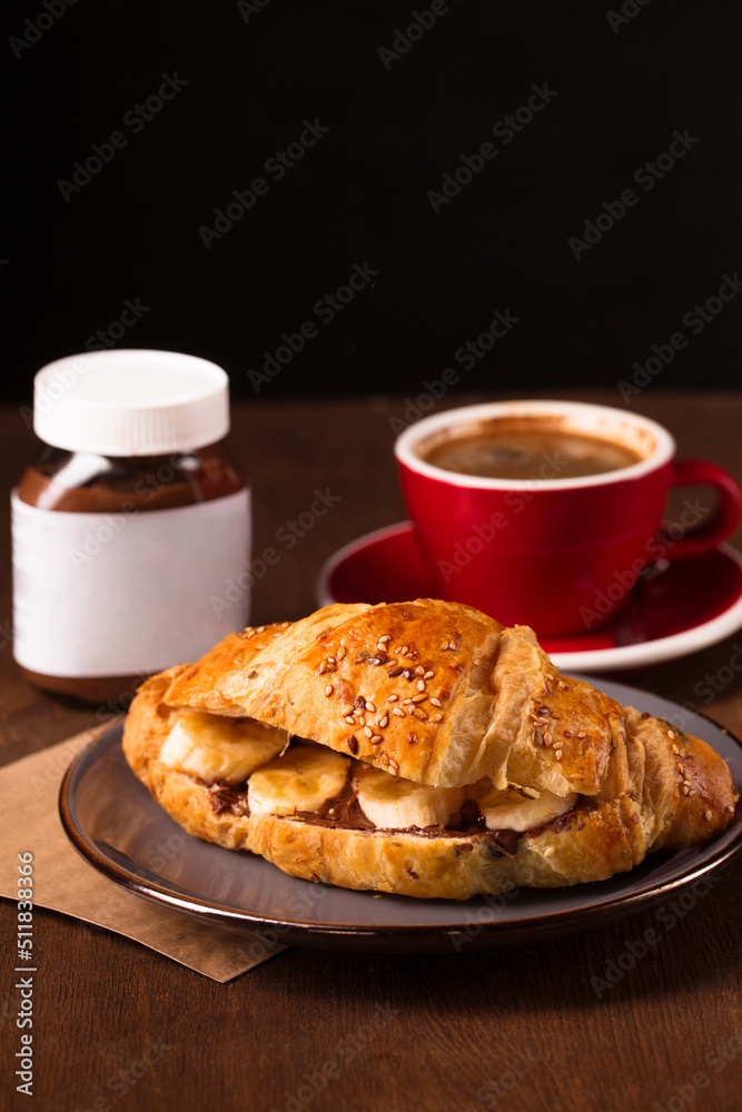 Crispy croissant with peanut butter, banana and coffee Crispy croissant with peanut butter, banana and coffee