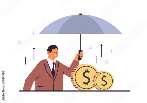 businessman holding umbrella over dollar coins financial safety investment protection concept
