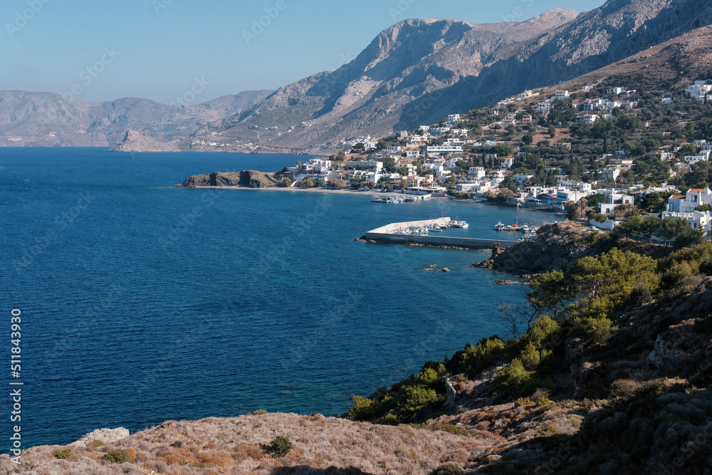 View of Kalymnos island and Mirties village on sunny day. Aegean Sea, Greece. View of Kalymnos island and Mirties village on sunny day. Aegean Sea, Greece.