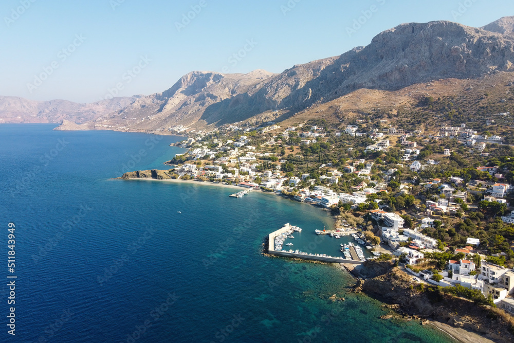 Aerial view of Mirties village on Kalymnos island on sunny day. Aegean Sea, Greece.