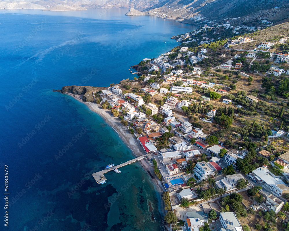 Drone view of Mirties village on Kalymnos island on sunny day. Aegean Sea, Greece.