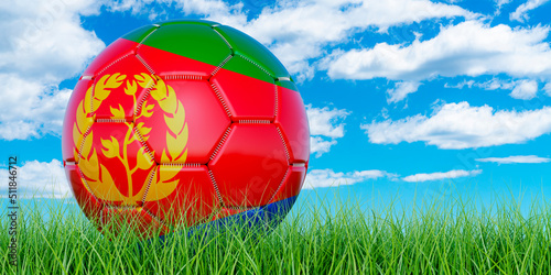 Soccer ball with Eritrean flag on the green grass against blue sky  3D rendering