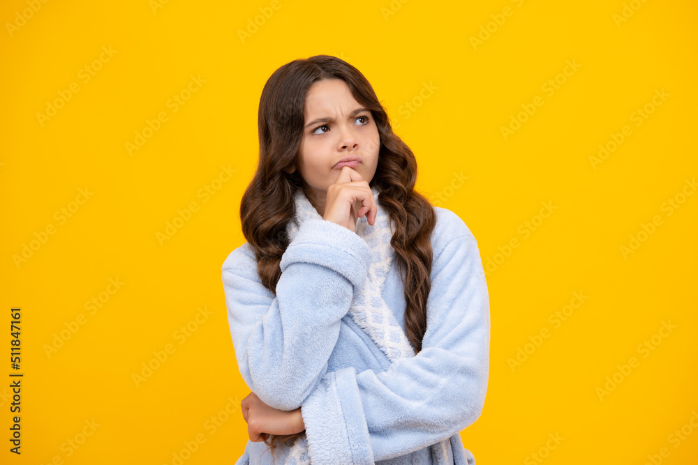 Teenager girl 12, 13, 14 years old thinking against yellow background. Child think and creative idea concept. Thinking pensive clever teenager girl. Teenager girl 12, 13, 14 years old thinking against yellow background. Child think and creative idea concept. Thinking pensive clever teenager girl.
