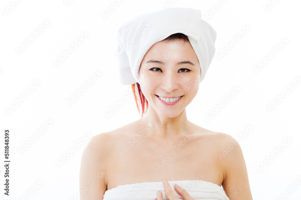 Chinese American woman wearing a white towel, beauty concept Chinese American woman wearing a white towel, beauty concept