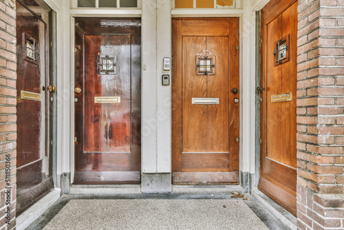 Entrance to the building with four doors photo