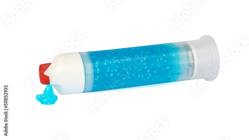 tube of toothpaste with dispenser on white background