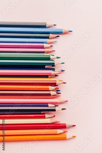 Colored pencil set, sharpened pencils of different colors. Copy space. back to school