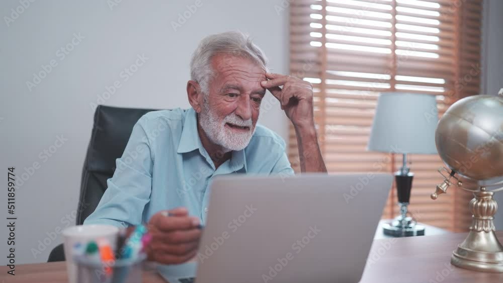 elderly caucasian businessman using laptop to work, old adult mature man using computer on desk in business office, male senior entrepreneur with technology at home workplace to teamwork communication elderly caucasian businessman using laptop to work, old adult mature man using computer on desk in business office, male senior entrepreneur with technology at home workplace to teamwork communication