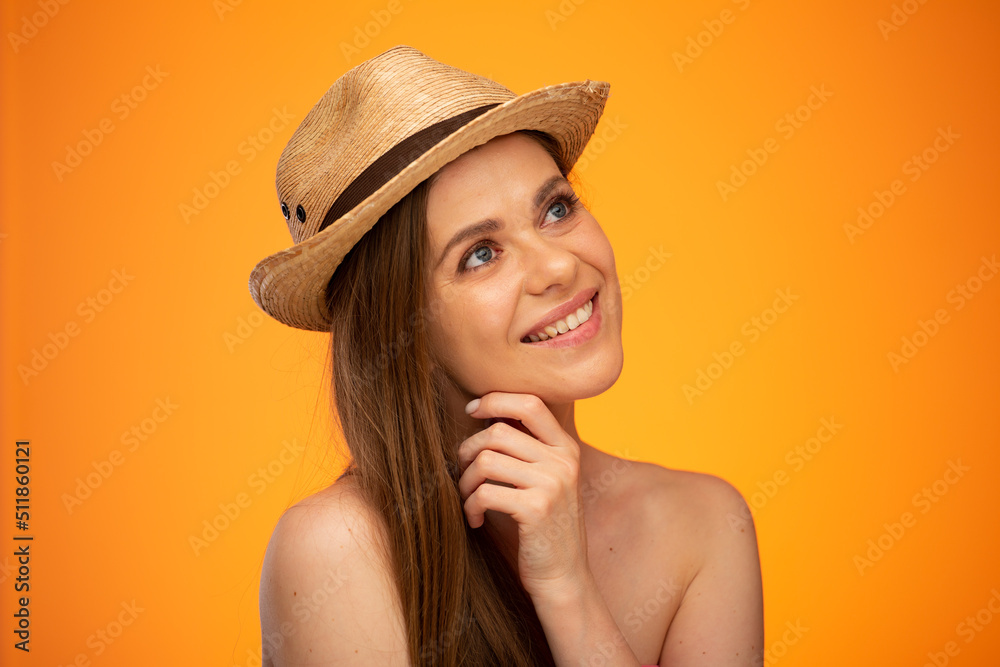 Happy smiling woman with bared shoulders wearing Mexican hat looking up, isolated female portrait. Happy smiling woman with bared shoulders wearing Mexican hat looking up, isolated female portrait.