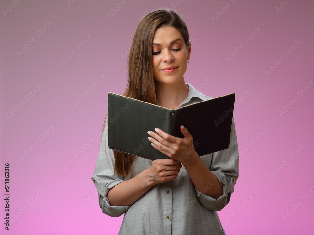 Smiling woman reading book, isolated portrait. Smiling woman reading book, isolated portrait.
