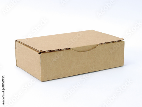 The cardboard packaging box is light brown on a white background.