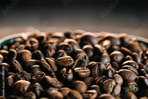 Background with coffee beans, close-up, texture