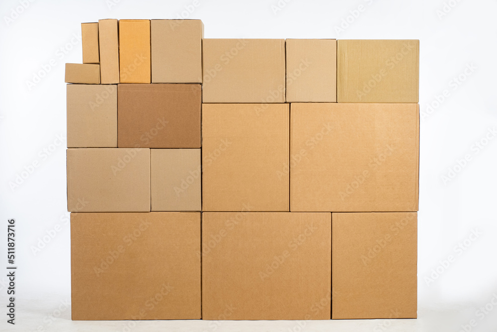 Boxes in the warehouse. Cardboard boxes for packaging an industrial mechanism. Warehouses. Packaging of finished products of the plant. Sale of packaging materials. Boxes in the warehouse. Cardboard boxes for packaging an industrial mechanism. Warehouses. Packaging of finished products of the plant. Sale of packaging materials.