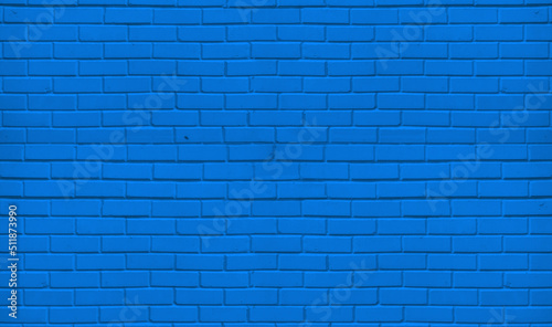 A blue brick wall. The brick wall painted in blue. © vegsingh