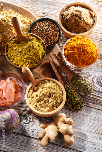 Fototapeta Naklejka Na Ścianę i Meble -  Composition with assortment of spices and herbs