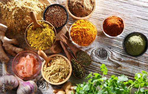 Fototapeta Naklejka Na Ścianę i Meble -  Composition with assortment of spices and herbs