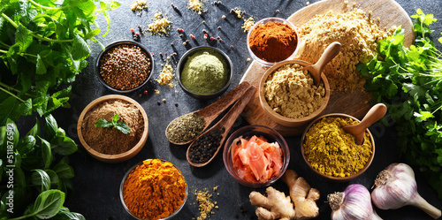 Fototapeta Naklejka Na Ścianę i Meble -  Composition with assortment of spices and herbs
