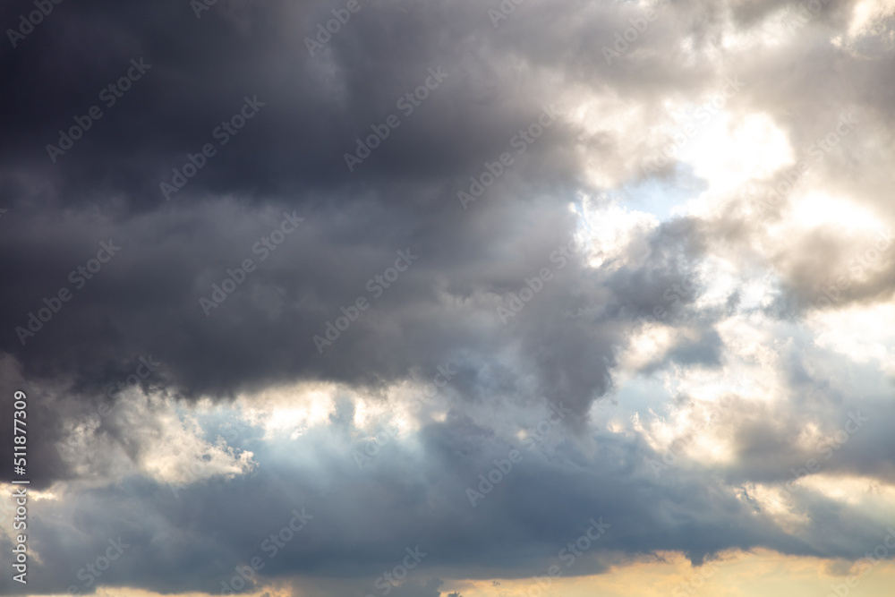 Cloud on blue sky background. Cloudscape grey and orange shade. Twilight light color the cloudy sky