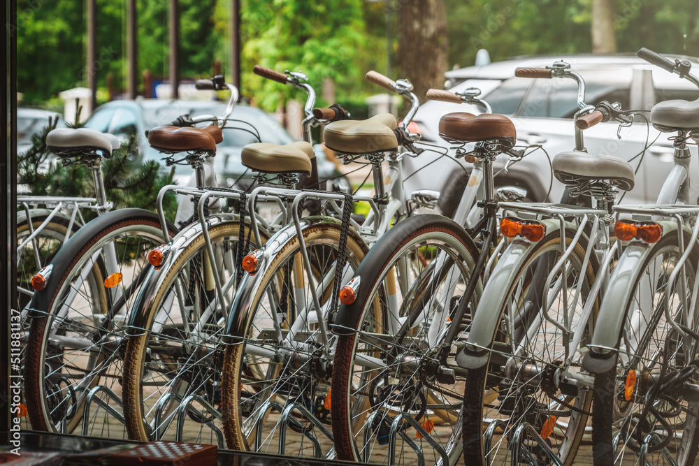 Bicycles in row for rent, view from hotel. Vacation and lifestyle concept. Bicycles in row for rent, view from hotel. Vacation and lifestyle concept.