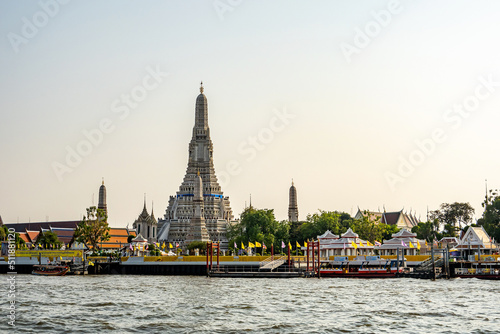 The view of the famous temple called Wat Arun located next to the grand river called chao Phraya in Bangkok city , Thailand.  © guidenuk