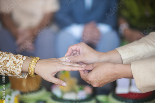 The people or couple and stuff in wedding ceremony in Thailand