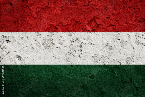 Flag of Hungary on grunge dirty wall as background