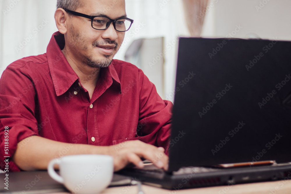 Happy man wearing glasses and smiling Happy man wearing glasses and smiling