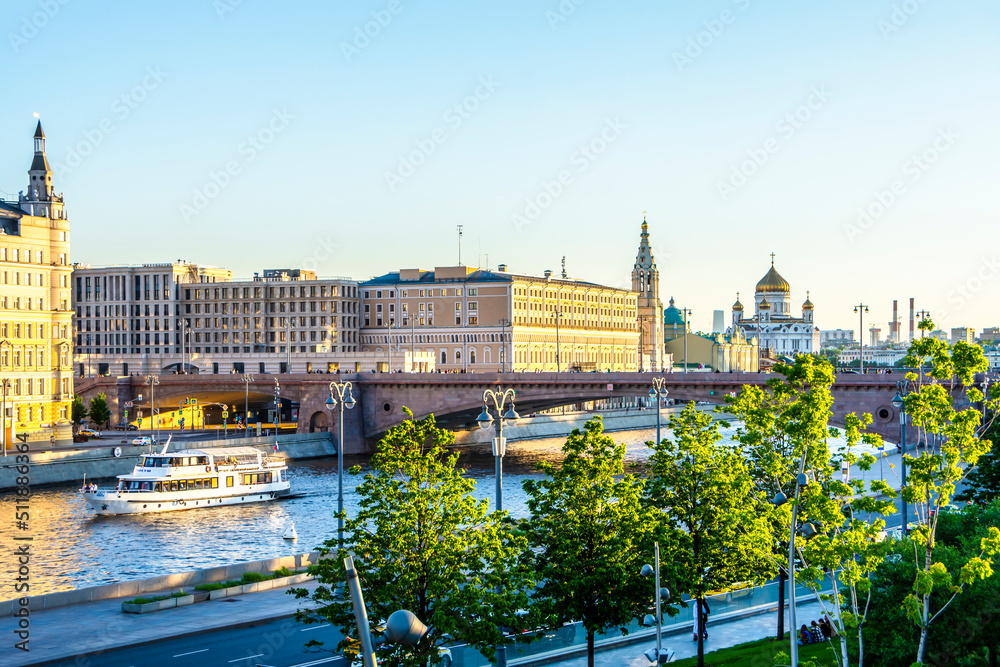 Moscow, Russia - June 2022: View of the Bolshoi Moskvoretsky bridge, Moscow river and Cathedral of Christ the Savior in the evening