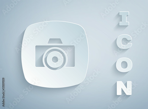 Paper cut Photo camera icon isolated on grey background. Foto camera. Digital photography. Paper art style. Vector