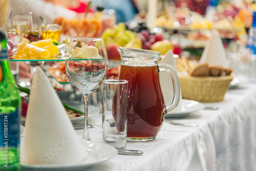 catering buffet table with drinks and appetizers