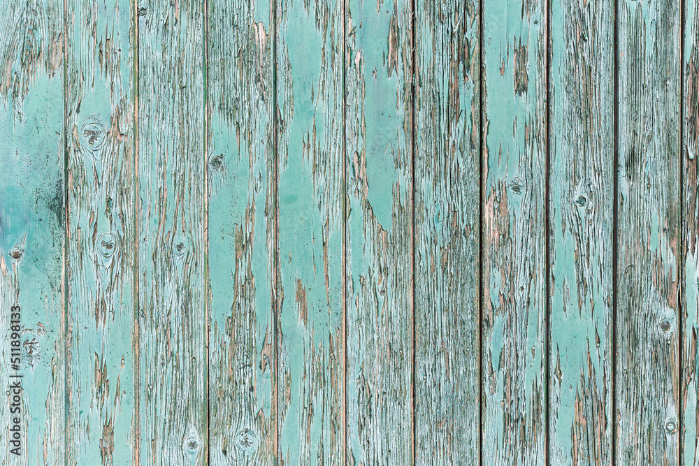 abgeblätterte türkisfarbene Wand aus Brettern Nahaufnahme Hintergrund