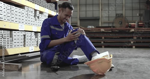 Asian male staff Knee injury, Industrial accident.
