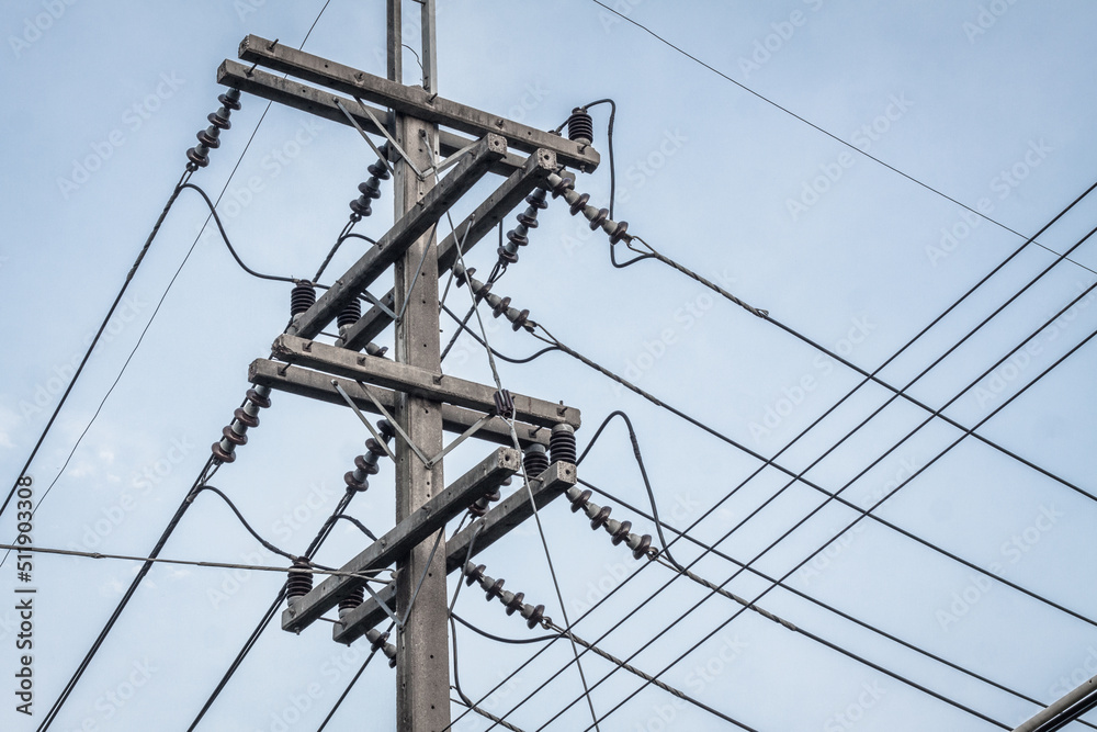 Electric poles, cables and electric poles systematically arranged, electrical and lightning poles high angle, network, power lines Electric poles, cables and electric poles systematically arranged, electrical and lightning poles high angle, network, power lines