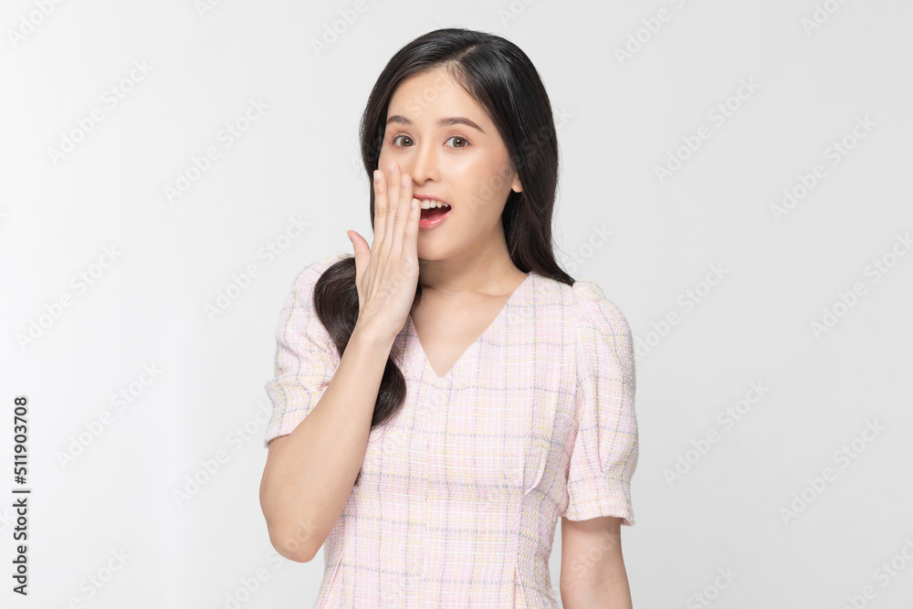Excited Asian young woman smiling and happiness. Cheerful female with casual looking at camera and surprise isolated on white background. Expression shock price or mock up for display discount product Excited Asian young woman smiling and happiness. Cheerful female with casual looking at camera and surprise isolated on white background. Expression shock price or mock up for display discount product