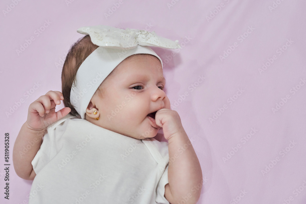 Baby Girl with white Flower Headband. 2-month-old baby girl. Baby Girl with white Flower Headband. 2-month-old baby girl.