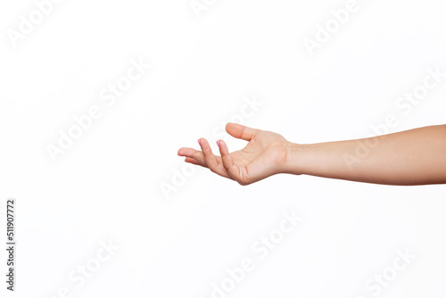 Murais de parede A caucasian female outstretched hand makes a gesture like holding something or asking for help isolated on a white background