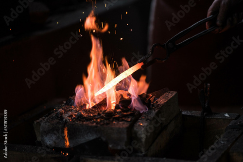bright fire in the forge with sparks