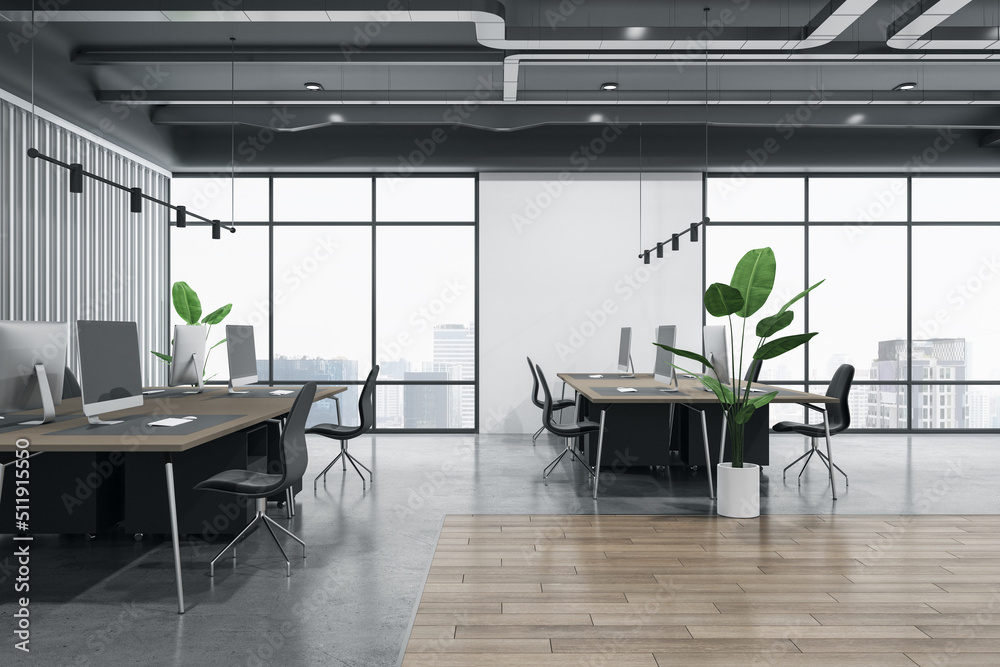 Side view on workspaces in coworking office with city view from big windows, wooden and concrete floor, green plants and modern computers on brown tables. 3D rendering Side view on workspaces in coworking office with city view from big windows, wooden and concrete floor, green plants and modern computers on brown tables. 3D rendering